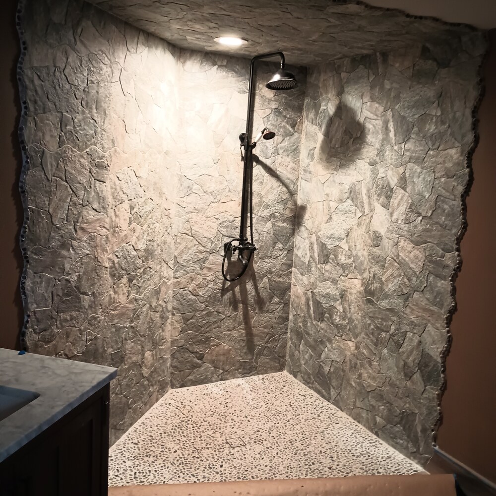 Media — Dark Stone Shower · Pebble Floor